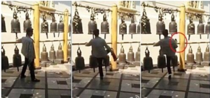 華人遊客在泰國腳踢寺廟古鐘遭討伐
