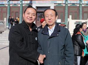 楊超凡與國務院副秘書長李樹文親切握手